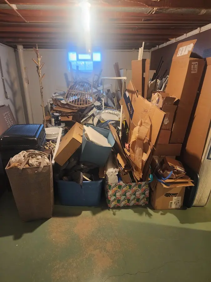 Roll-off dumpster container at job site for 8 Yard Dumpster Rental in Hapeville